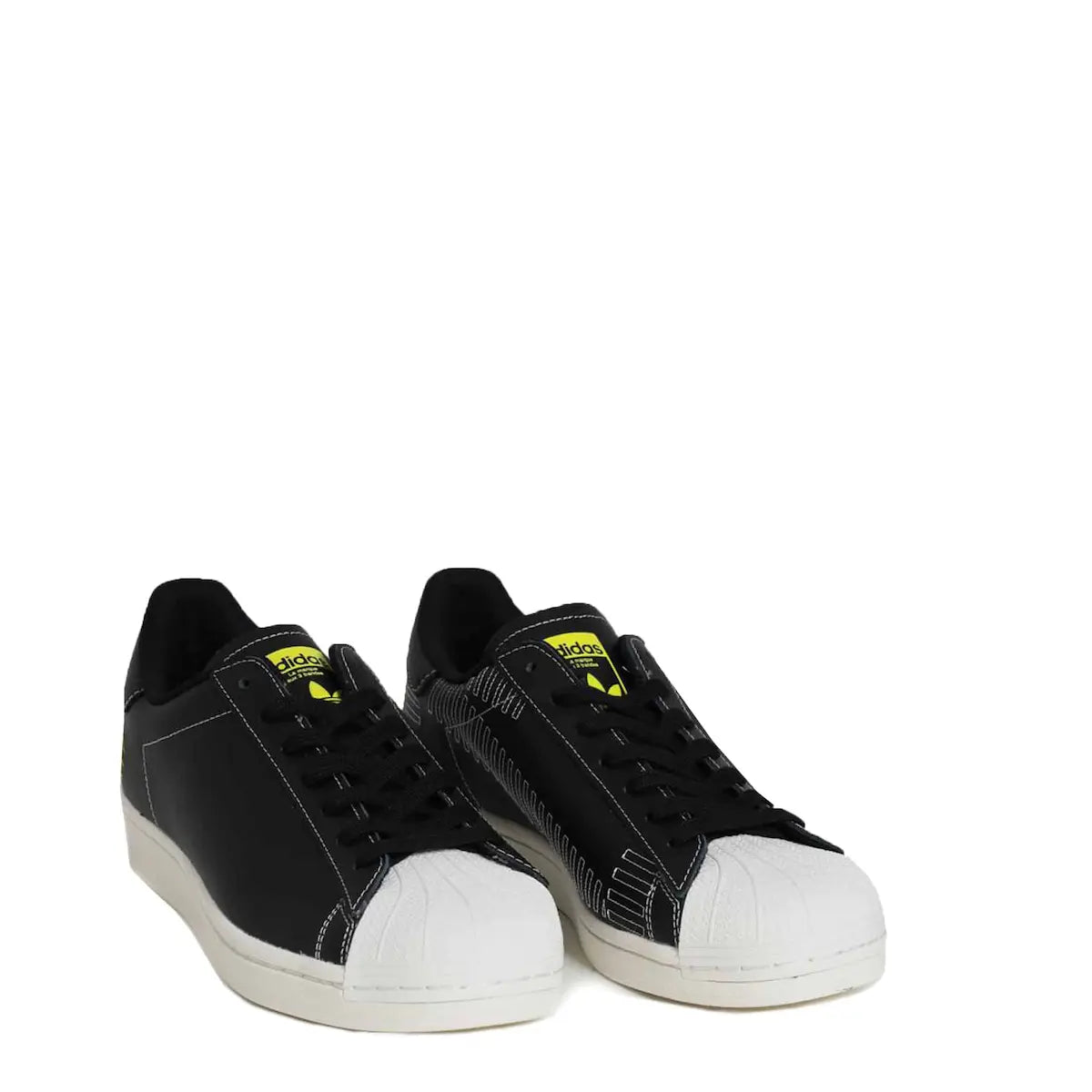 Black sneakers with white soles on a white background