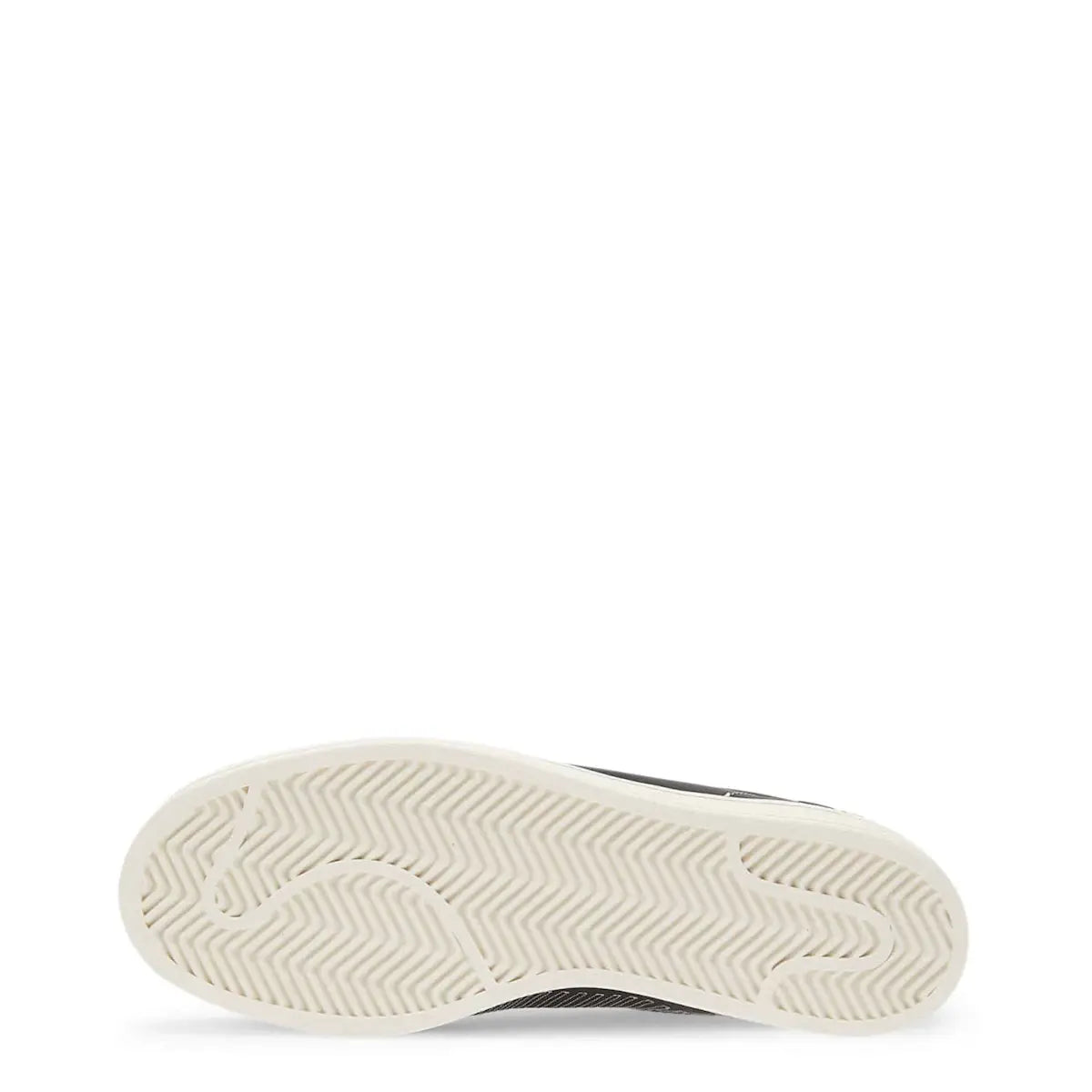 Close-up of a shoe sole with tread pattern on a white background